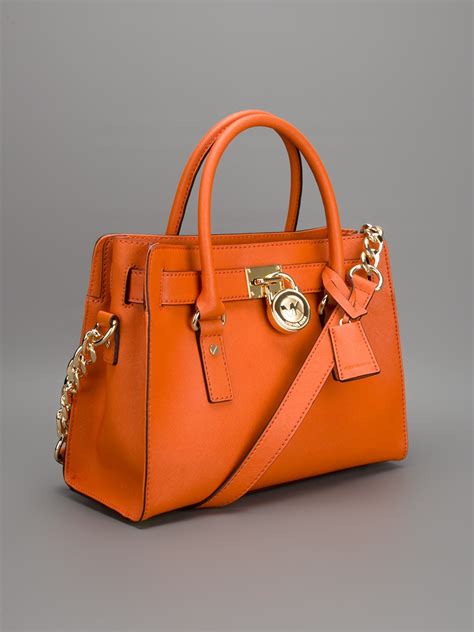 michael kors orange tote mk monogram|michael kors tote bag pink.